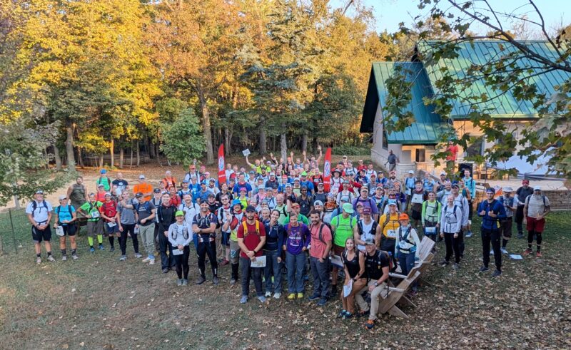 Wild Driftless adventure race participants take a group photo just before the start of the 9-hour race on October 4, 2025, at Camp Ewalu.